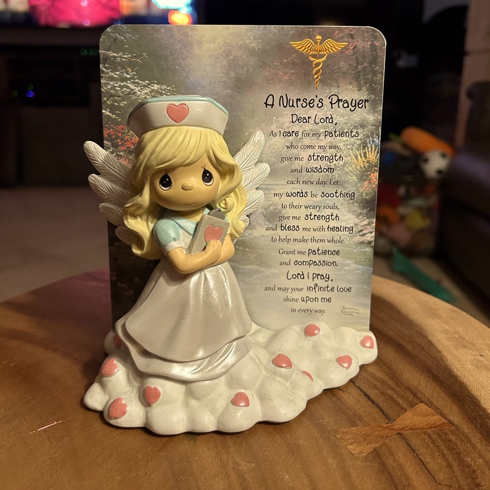 Precious moments, collector piece “a nurses’s prayer”